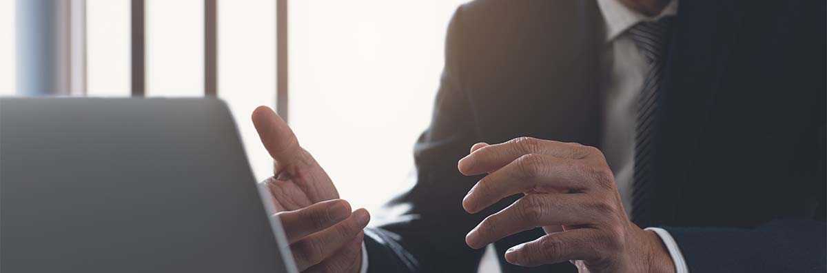 picture of an attorney talking to a client over video